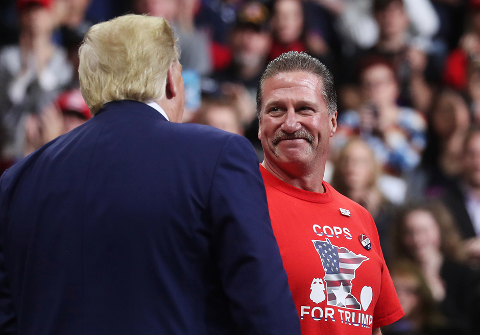 President Donald Trump shared the stage with then-Police Officers Federation of Minneapolis President Lt. Bob Kroll at an Oct. 10, 2019 rally in Minneapolis. Kroll has been recommended for the job of U.S. Marshal.
