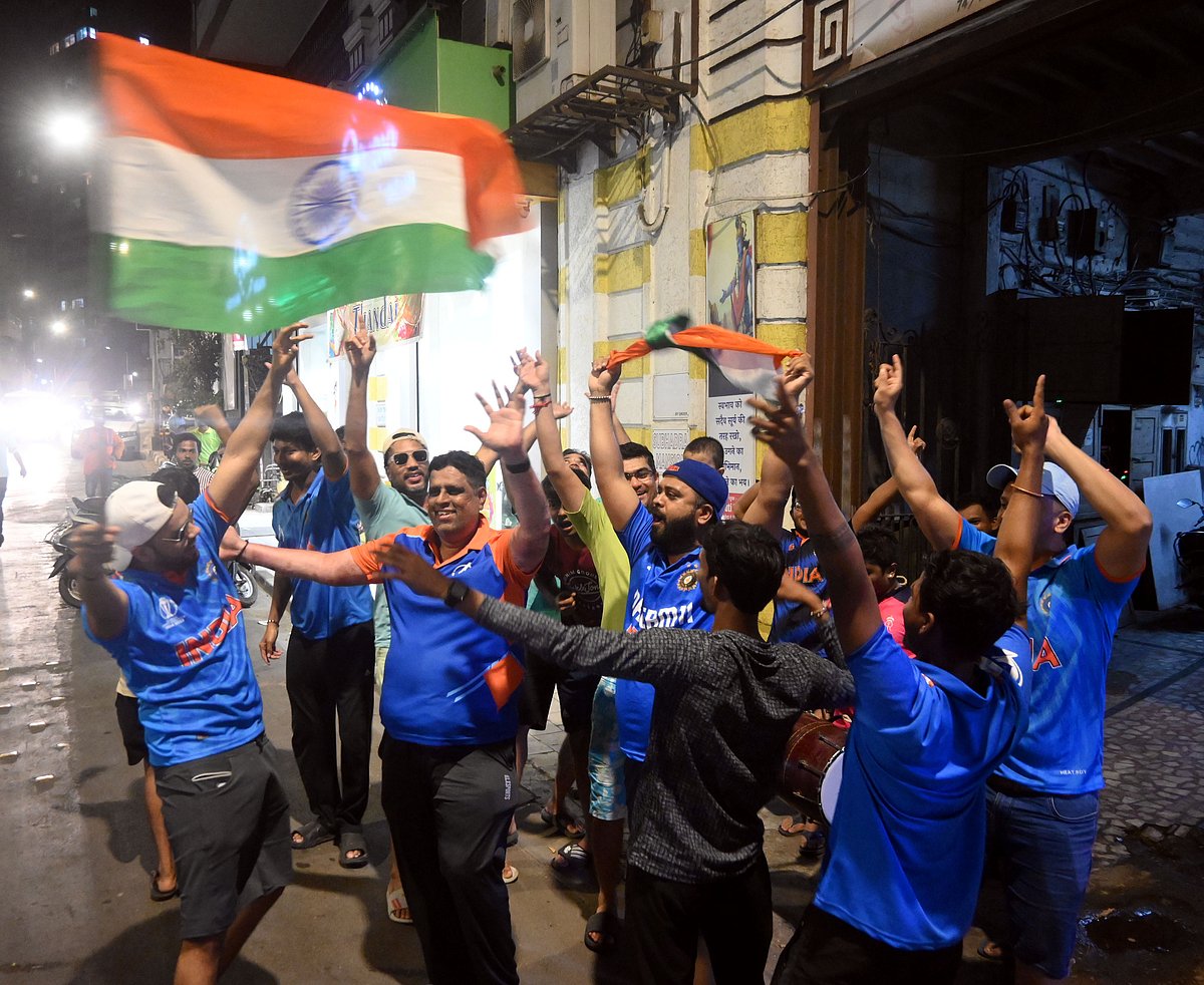 Cricket supporters dance their heart out at  India's win.