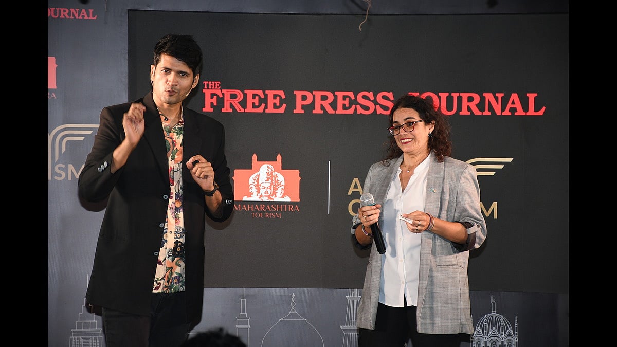 Mentalist and illusionist Vivek Singhi regaled the audience with his performance. On stage here with Maria, from the consulate of Argentina