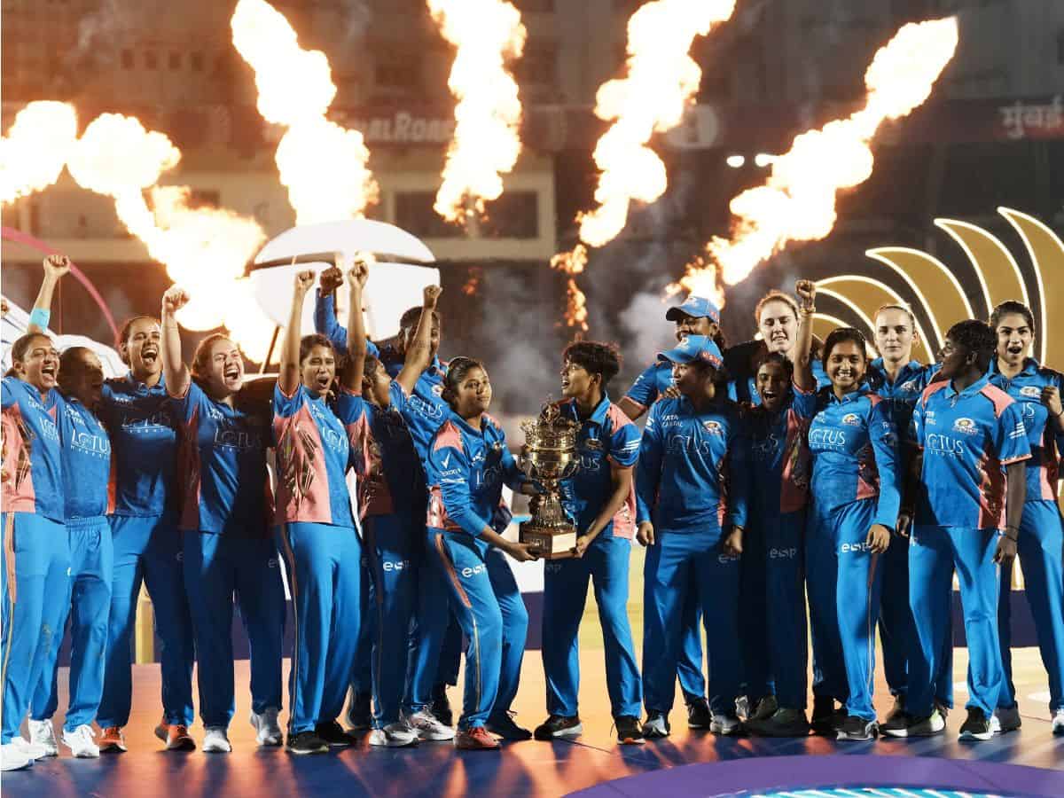 Mumbai Indians players celebrate their win against Delhi Capitals in the Women's Premier League (WPL) 2025 final cricket match, in Mumbai, Saturday, March 15, 2025. (PTI Photo/