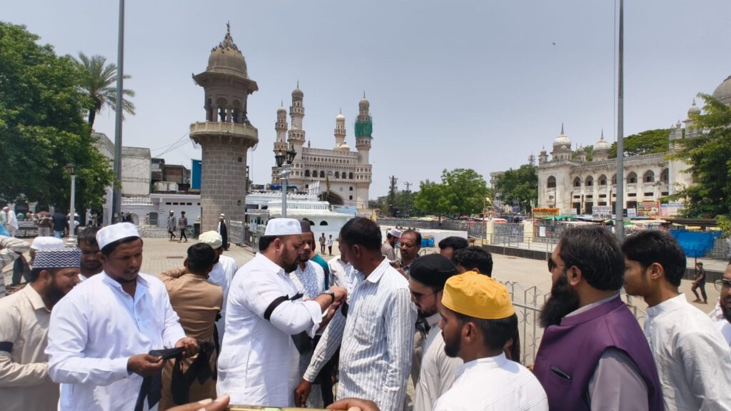 Muslims wear black armbands and attend Friday prayers.