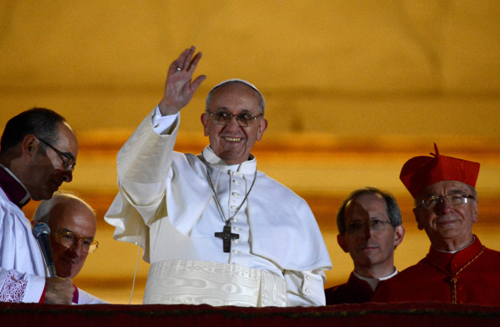 FILE PHOTO: Newly elected Pope Francis, Cardinal Jorge Mario Bergoglio of Argentina appears on the balcony of St. Peter's ...