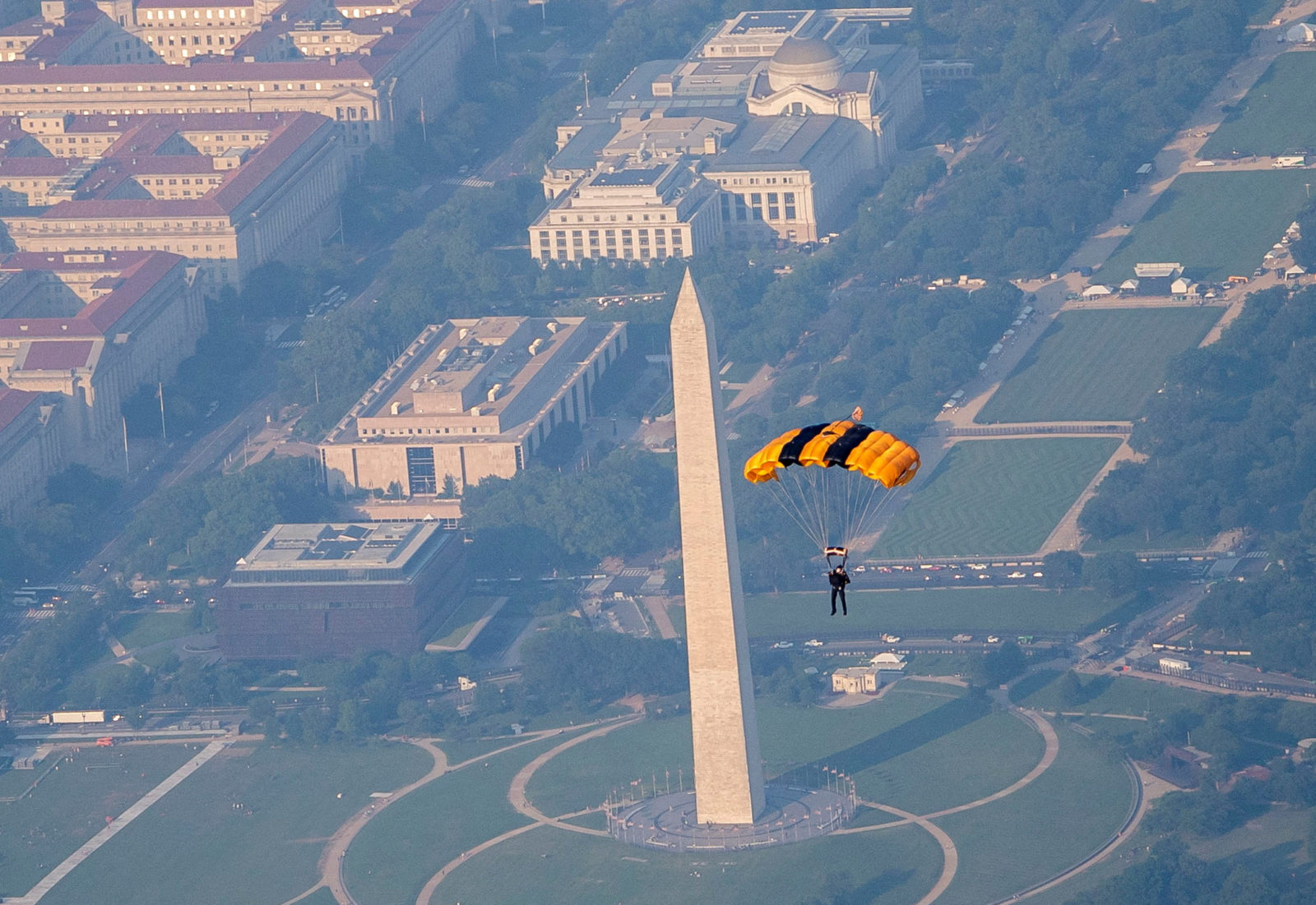 U.S. Army Golden Knights parachute team perform during the Twilight Tattoo ceremony