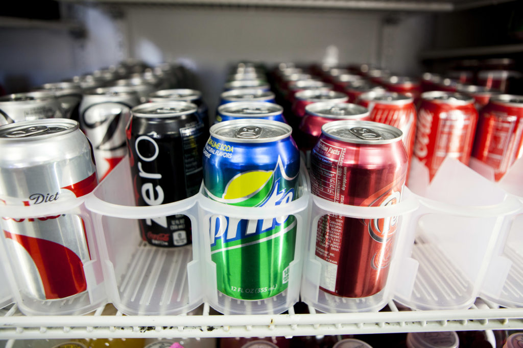 Cans of soda are displayed at Kwik Stops Liquor in San Diego