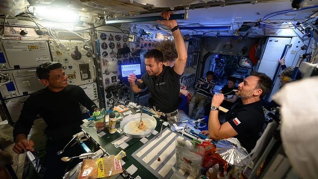 Shubhanshu Shukla with Axiom-4 crew members enjoying meal on ISS