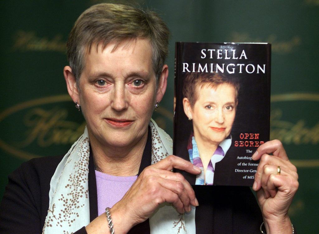 Former MI5 Director-General Stella Rimington holds a copy of her autobiography "Open Secret" at a Ce..