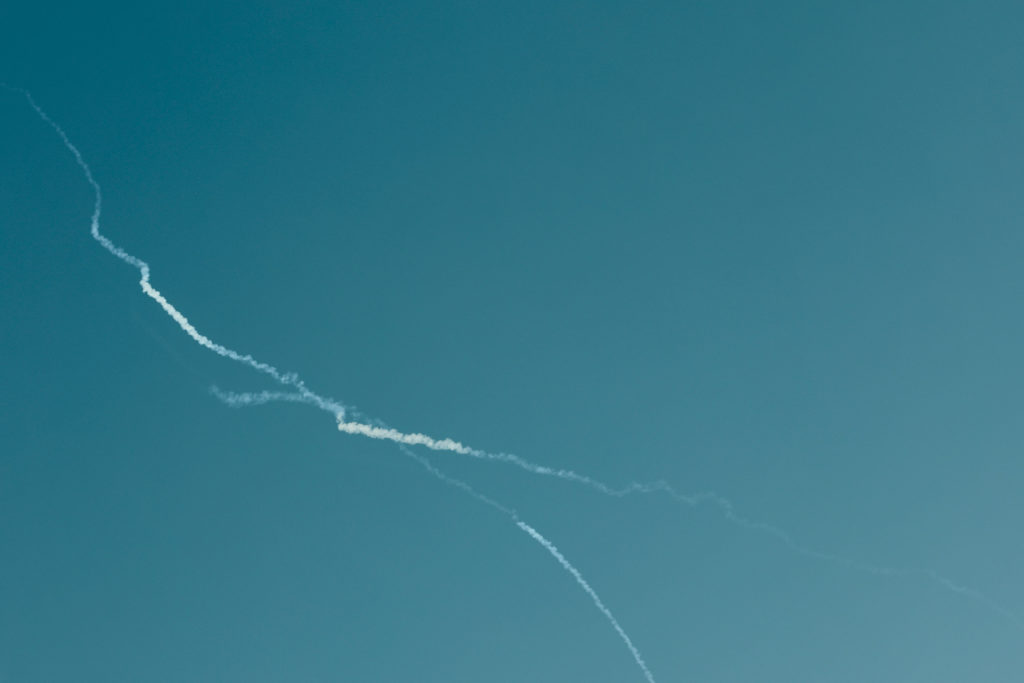 Smoke is left in the sky after reported Iranian missile attacks, following strikes by the United States and Israel against...