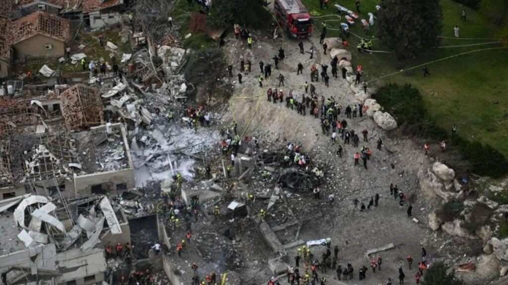 Explosion aftermath in a residential area with debris, rescue workers, and emergency response teams manag.