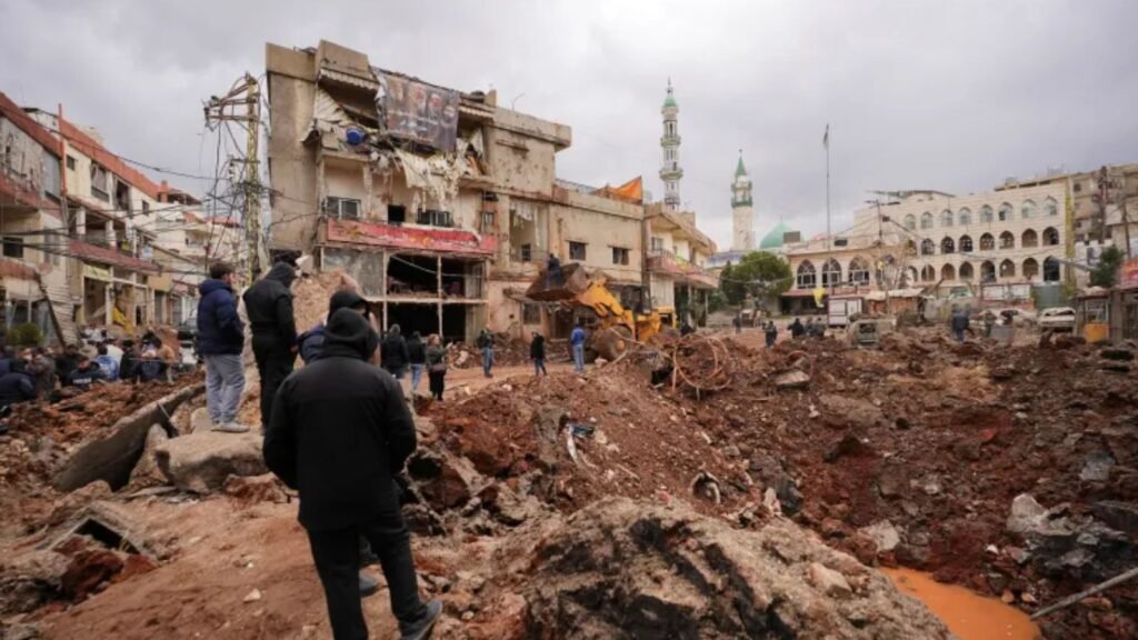 Explosion aftermath in a city with damaged buildings and debris.