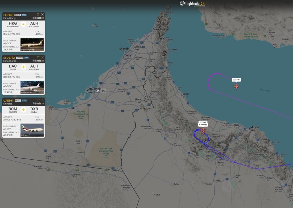 FlightRadar24 map shows Etihad flights diverted to Muscat instead of Abu Dhabi.