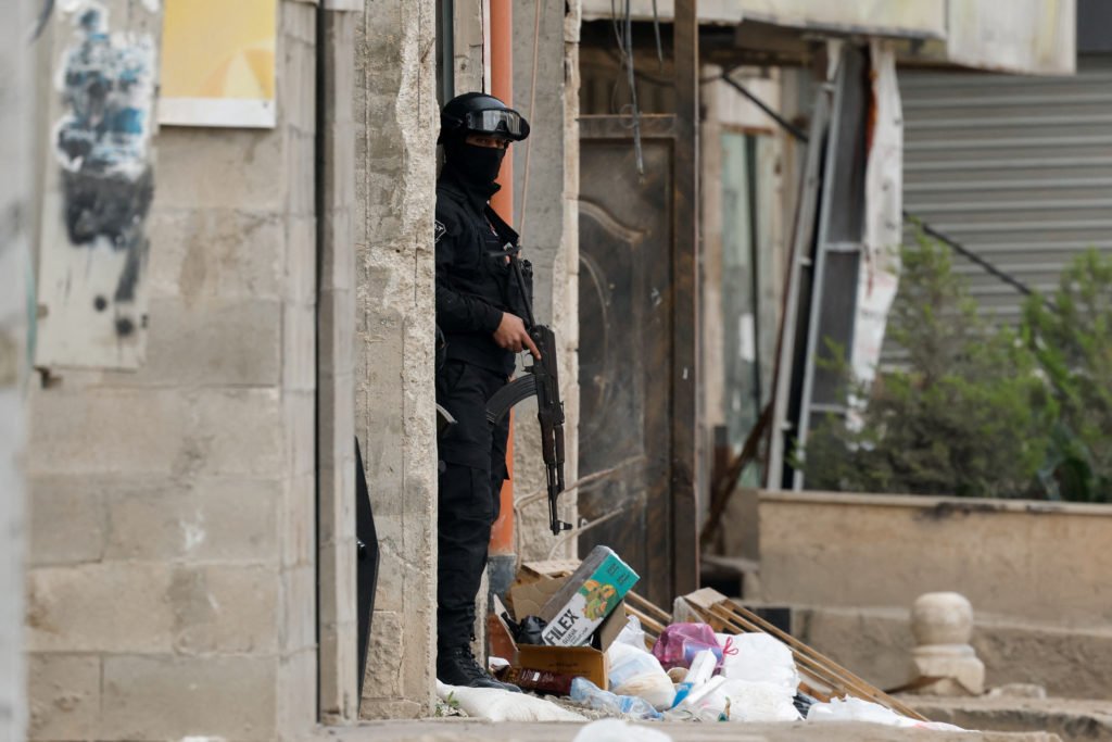 Palestinian security forces operate at the camp in Jenin