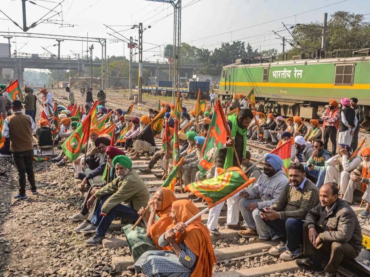 Farmers on Railway track