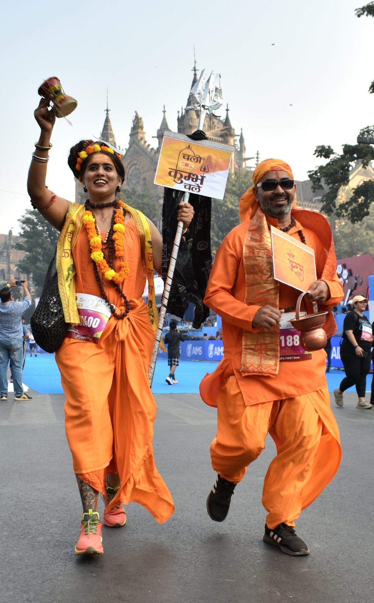 Mahakumbh Craze Engulfs Mumbai Marathon As Duo Sports Ascetic Outfits Motivating People To Visit Kumbh