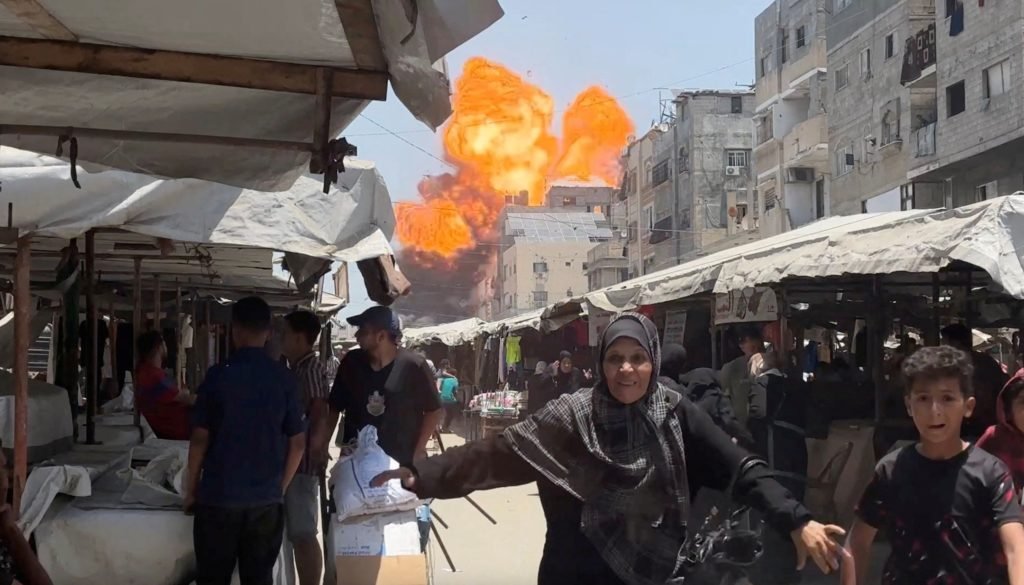 News Wrap: 3 killed and dozens more hurt heading to Gaza aid distribution site